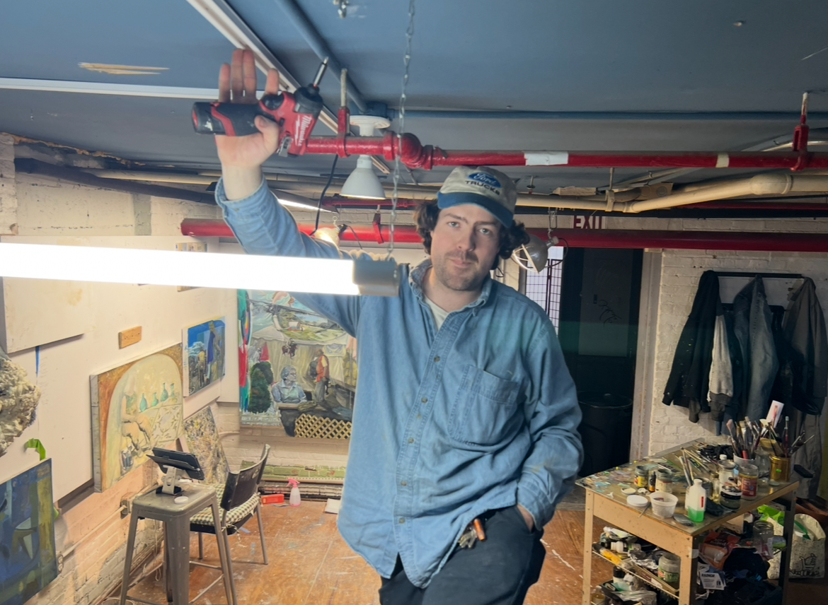 Handsome guy installs lights